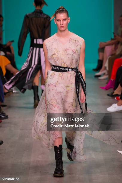 Model walks the runway during the Akira show at Mercedes-Benz Fashion Week Resort 19 Collections at Carriageworks on May 17, 2018 in Sydney,...