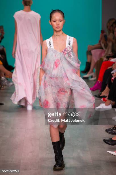Model walks the runway during the Akira show at Mercedes-Benz Fashion Week Resort 19 Collections at Carriageworks on May 17, 2018 in Sydney,...