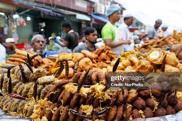 Traditional iftar items on sale at makeshift shop at chawkbazar in Old part of Dhaka, Bangladesh on May 18, 2018. Dhakas residents gathered at the...