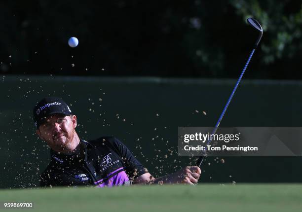 Jimmy Walker plays a shot from a bunker on the 13th hole during the second round of the AT&T Byron Nelson at Trinity Forest Golf Club on May 18, 2018...