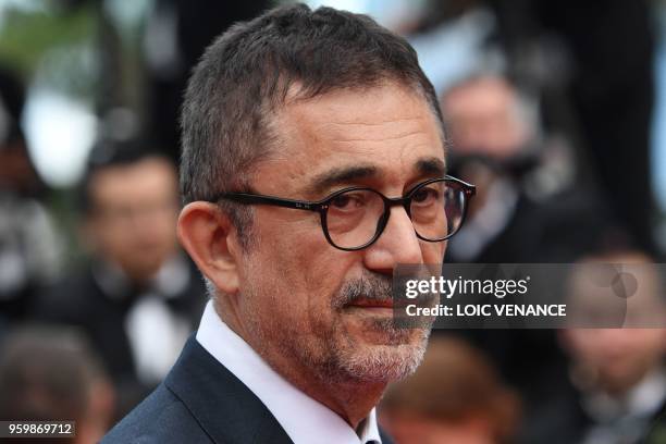 Turkish director Nuri Bilge Ceylan poses as he arrives on May 18, 2018 for the screening of the film "The Wild Pear Tree " at the 71st edition of the...