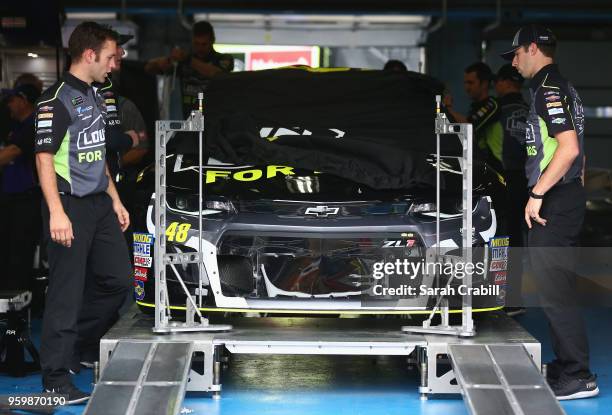 The Lowe's for Pros Chevrolet is inspected during practice for the Monster Energy NASCAR Cup Series All-Star Race at Charlotte Motor Speedway on May...