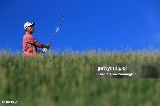 Marc Leishman of Australia plays his tee shot on the 12th hole during the second round of the AT&T Byron Nelson at Trinity Forest Golf Club on May...