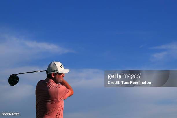 Marc Leishman of Australia plays his tee shot on the 11th hole during the second round of the AT&T Byron Nelson at Trinity Forest Golf Club on May...