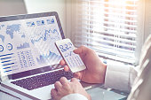 Business analytics dashboard technology on screen, financial operations statistics KPI
