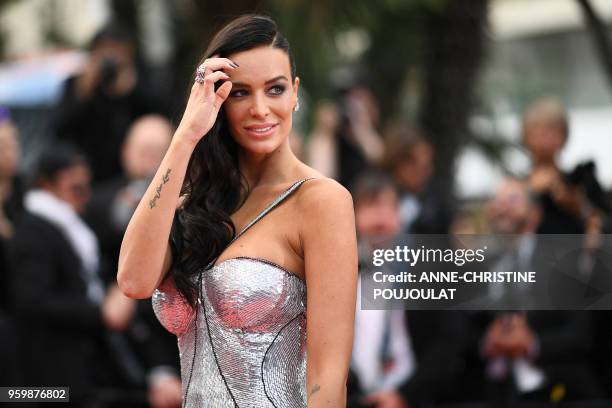 The wife of French businessman Arnaud Lagardere, Jade Foret poses as she arrives on May 18, 2018 for the screening of the film "The Wild Pear Tree "...