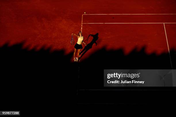 Maria Sharapova of Russia serves to Jelena Ostapenko of Latvia in the Quarter Final during day six of the Internazionali BNL d'Italia 2018 tennis at...