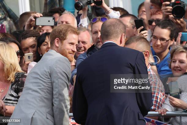 Prince Harry and Prince William meet the public during a pre wedding walkabout ahead of the royal wedding of Prince Harry to Meghan Markle on May 18,...