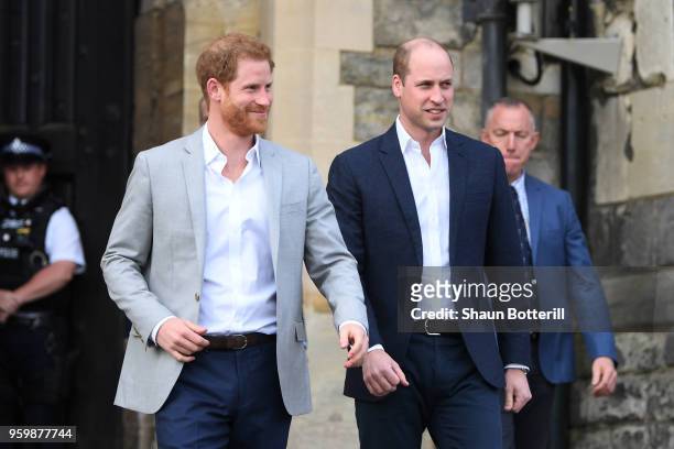 Prince Harry and Prince William, Duke of Cambridge embark on a walkabout ahead of the royal wedding of Prince Harry and Meghan Markle on May 18, 2018...