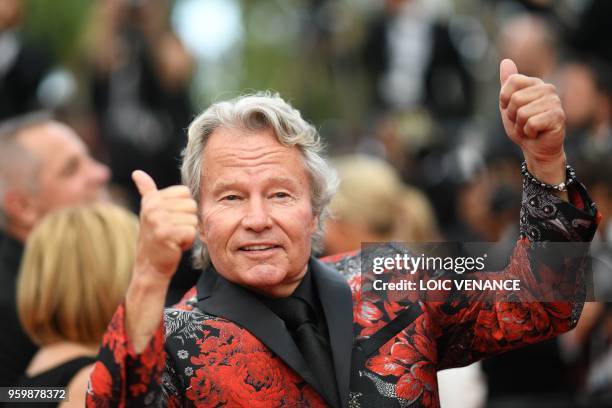 Actor John Savage poses as he arrives on May 18, 2018 for the screening of the film "The Wild Pear Tree " at the 71st edition of the Cannes Film...