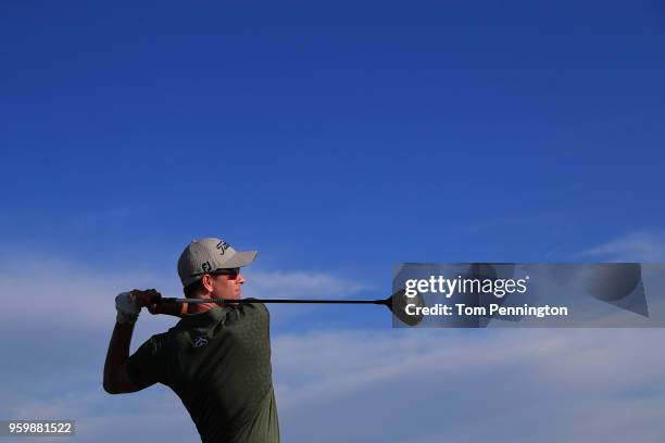 Adam Scott of Australia plays his tee shot on the 11th hole during the second round of the AT&T Byron Nelson at Trinity Forest Golf Club on May 18,...