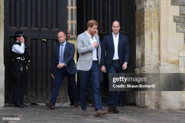 Prince Harry and Prince William, Duke of Cambridge embark on a walkabout ahead of the royal wedding of Prince Harry and Meghan Markle on May 18, 2018...