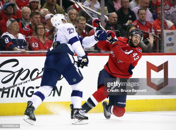 Ryan McDonagh of the Tampa Bay Lightning and Tom Wilson of the Washington Capitals battle in Game Four of the Eastern Conference Finals during the...