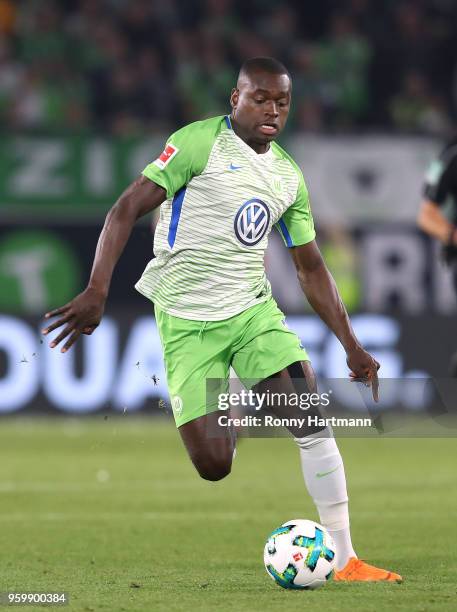 Nany Landry Dimata of Wolfsburg runs with the ball during the Bundesliga Playoff Leg 1 match between VfL Wolfsburg and Holstein Kiel at Volkswagen...