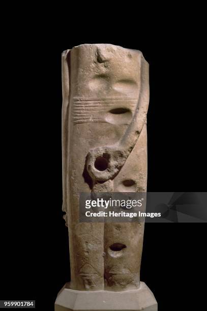 Statue of god Min, 3300 BC. Ithyphallic statue, complete from above armpits to below knees. Left hand holds phallus; right arm, elbow slightly bent,...