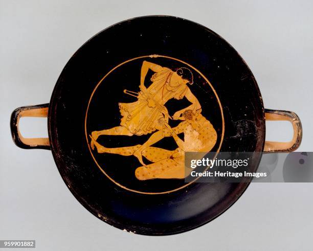 Kylix, c500BC. Athenian red-figure kylix ; depiction of Theseus and the Minotaur. Dimensions: height: 8.1 cmdiameter: 20 cmArtist Apollodoros.