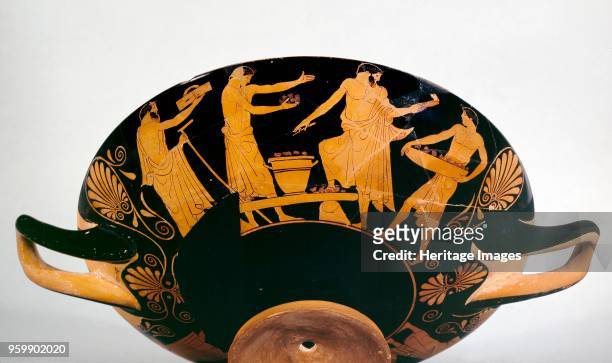 Cup, 470-460BC. Athenian red-figure cup; bearded male and a slave; youths; the sacrificial scenes have never been satisfactorily explained: on one...
