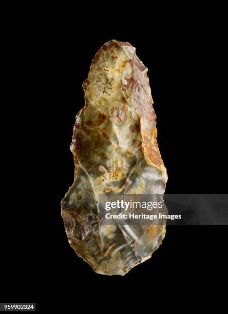 Handaxe, Lower Palaeolithic Period , c800,000-c200,000BC. Handaxe, pointed. Label reads Found in situ in the gravel at St Acheul, Amiens by J.W....
