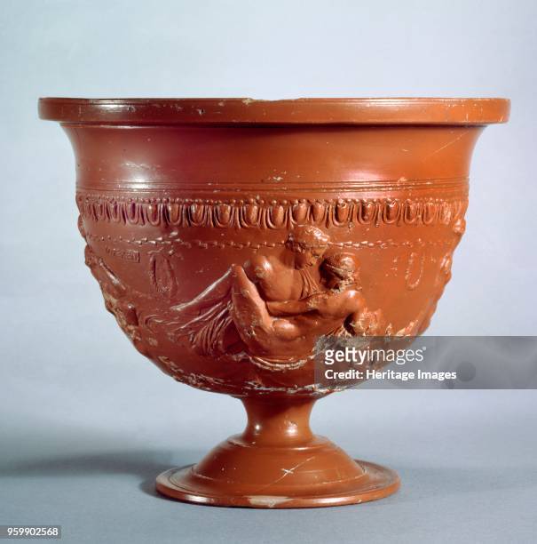 Crater, Roman, circa 1st century BC-1st century. Arretine ware crater with reliefs of lovers, youths and hetairai. Dimensions: thickness: 14.5 cm...
