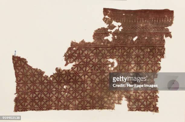 Textile fragment with interlocking spirals, 13th-14th century. Dimensions: warp x weft: 78 x 53 cm max.thread count: 14 / 13 threads/cmArtist Unknown.