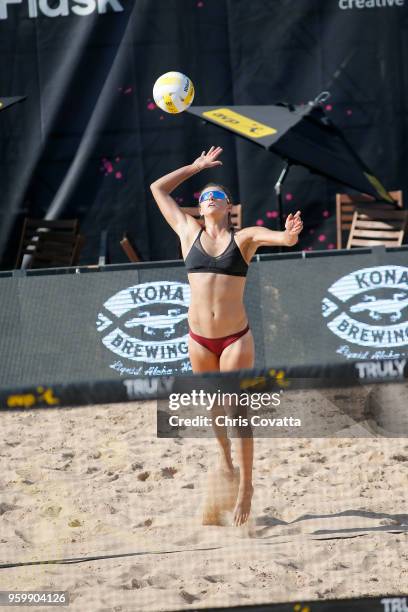 Lauren Fendrick serves the ball against Angela Bensend and Olaya Pazo during 2018 AVP Austin Open at Krieg Fields on May 18, 2018 in Austin, Texas.