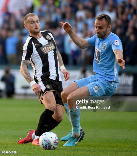 Lewis Alessandra of Notts County is challenged bu Liam Kelly of Coventry during the Sky Bet League Two Play Off Semi Final:Second Leg between Notts...