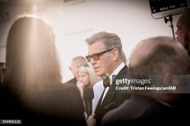 Pierce Brosnan attends the amfAR Gala Cannes 2018 dinner at Hotel du Cap-Eden-Roc on May 17, 2018 in Cap d'Antibes, France.