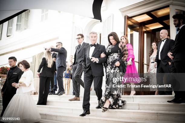 Pierce Brosnan and Keely Shaye Smith attend the amfAR Gala Cannes 2018 dinner at Hotel du Cap-Eden-Roc on May 17, 2018 in Cap d'Antibes, France.