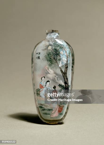 Snuff bottle depicting a scene from Strange Tales of a Scholar's Studio, early 20th century. The ghost couple serves the old mother. Dimensions:...