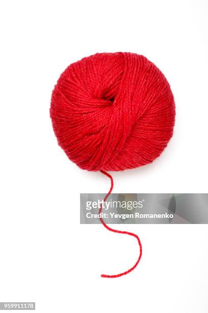red ball of wool on white background - wool stock pictures, royalty-free photos & images