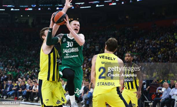 Nicolo Melli and Jan Vesely of Fenerbahce Dogus in action against Aarun White of Zalgiris Kaunas during the Turkish Airlines EuroLeague Final Four...