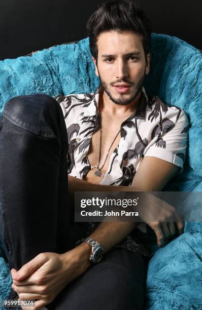 Sebastian Yatra poses for a Portrait at iHeart Latino Studio on May 17, 2018 in Miami, Florida.