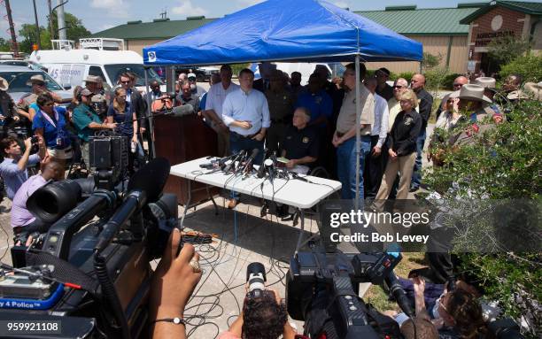 Sen.Ted Cruz, Texas Gov. Greg Abbott and Texas Lt. Gov. Dan Patrick speak to the media during a press conference about the shooting incident at Santa...