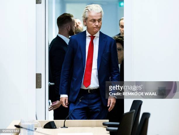 Netherlands politcian Geert Wilders looks on as he appears in court in Amsterdam on May 18, 2018. - An Amsterdam court has ordered that three judges...