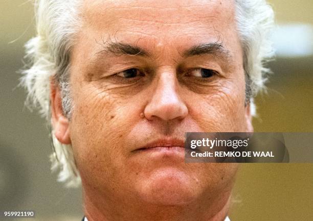 Netherlands politcian Geert Wilders looks on as he appears in court in Amsterdam on May 18, 2018. An Amsterdam court has ordered that three judges...