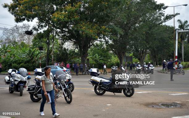 Police diverts the traffic in Havana after a Cubana de Aviacion aircraft crashed after taking off from the Jose Marti international airport on May...