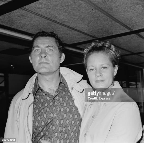 English actor Robert Shaw pictured with his wife, Scottish actress Mary Ure at Heathrow airport in London as they arrive to catch a flight to Madrid,...