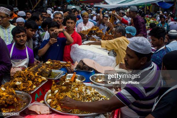 Bangladeshi vendor sells Iftar at chawkbazar in the capital Dhaka, Bangladesh on the first day of Muslim fasting month Ramadan on Friday, May 18,...