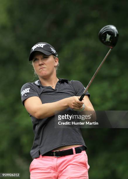 Austin Ernst watches her tee shot on the fourth hole during the second round of the Kingsmill Championship presented by Geico on the River Course at...
