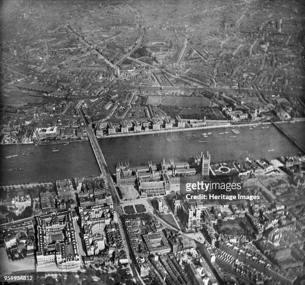 Palace of Westminster, London, 1909. Aerial view of the Houses of Parliament, Westminster Abbey and the River Thames taken from the balloon Corona on...