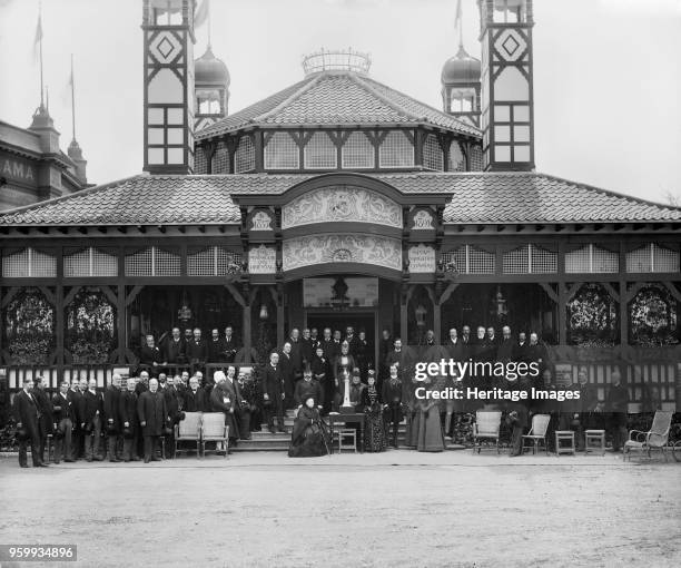 Queen Victoria visiting the Royal Naval Exhibition at the Royal Hospital, Chelsea, London, 1891. A group portrait of the Queen with Edward, Prince of...