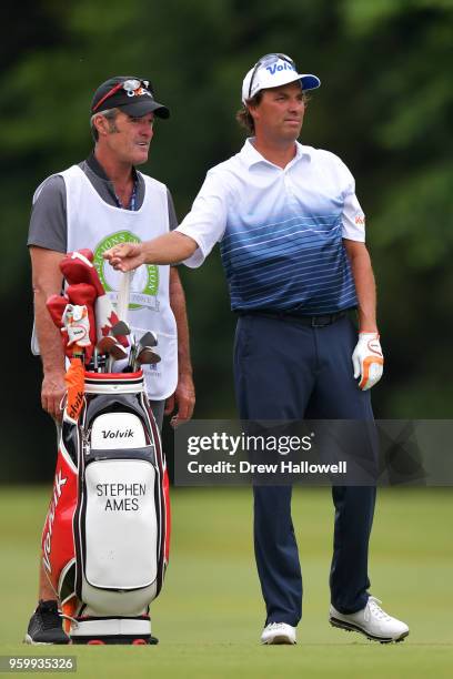 Stephen Ames of Canada reaches for a club on the sixth hole during the second round of the Regions Tradition at the Greystone Golf & Country Club on...