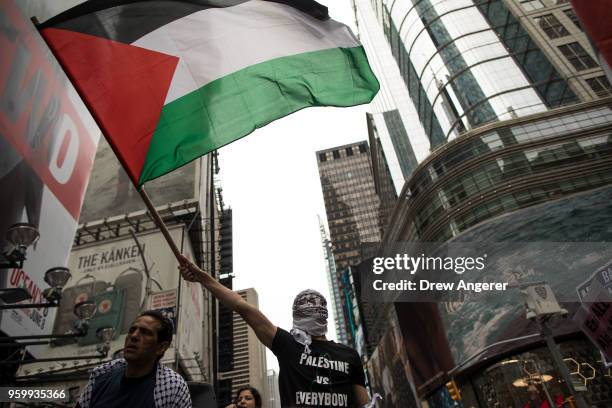 Members of the Palestinian community, fellow Muslims and their supporters rally in support of the Palestinian people in the wake of the recent...