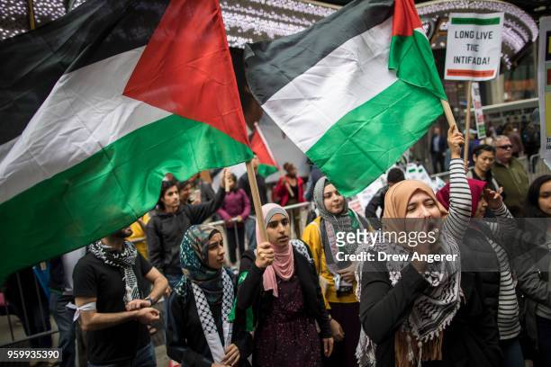 Members of the Palestinian community, fellow Muslims and their supporters rally in support of the Palestinian people in the wake of the recent...