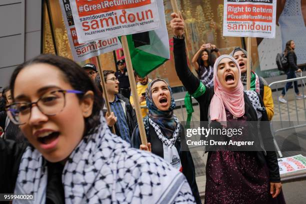 Members of the Palestinian community, fellow Muslims and their supporters rally in support of the Palestinian people in the wake of the recent...