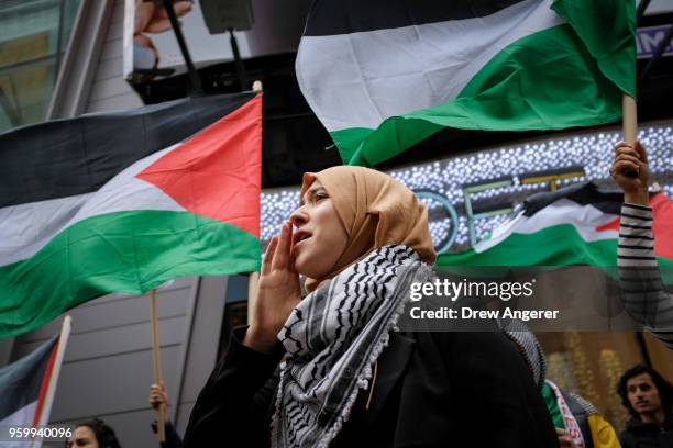 Members of the Palestinian community, fellow Muslims and their supporters rally in support of the Palestinian people in the wake of the recent...