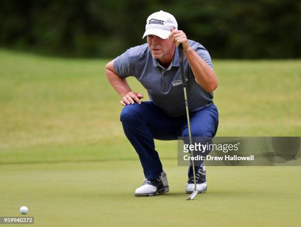 Steve Stricker of the United States lines up a putt on the fifth green during the second round of the Regions Tradition at the Greystone Golf &...