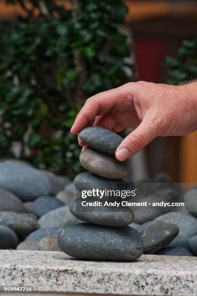 stacking rocks - andy clement stock pictures, royalty-free photos & images