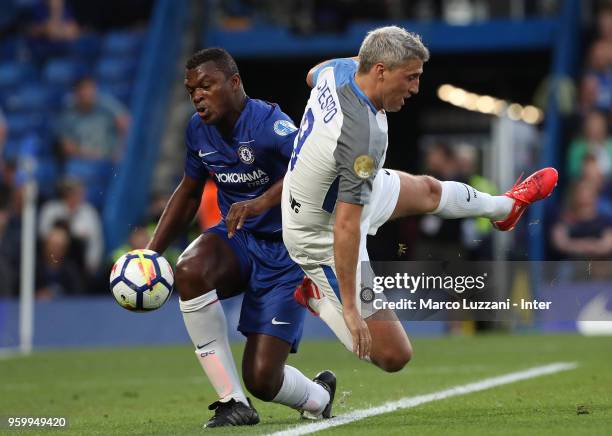 Marcel Desailly of Chelsea Legends competes for the ball with Hernan Crespo of Inter Forever during Chelsea Legends v Inter Forever at Stamford...