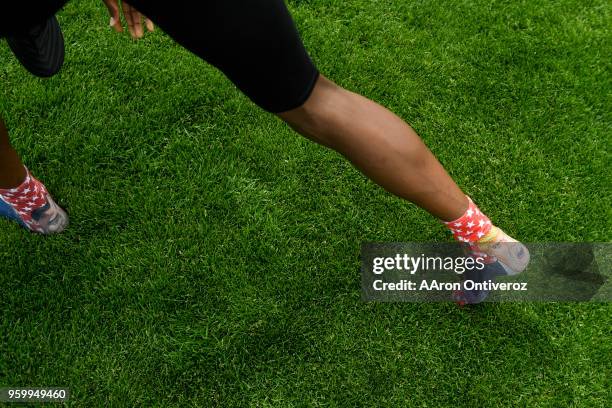 Evan-Emian Bell of Alamosa rocks presidential socks featuring Barack Obama and Donald Trump at the Colorado State Track and Field Championships on...